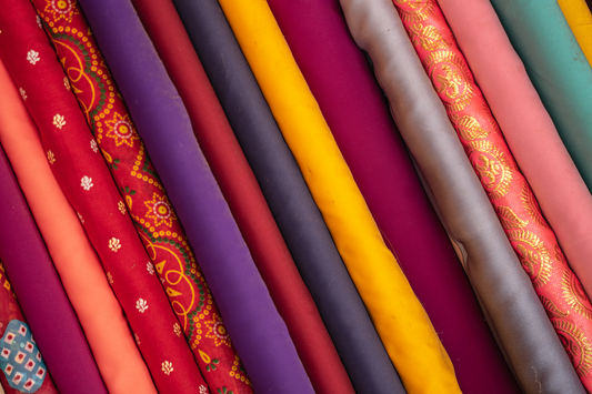 How to Choose the Right Fabric for Your Sewing Project: A Beginner-Friendly Guide to Fiber, Weight, and Drape
